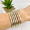 Statement bangle in silver with an adjustable fit. Cuff style bracelet can be adjusted to get the perfect fit. KookyTwo.