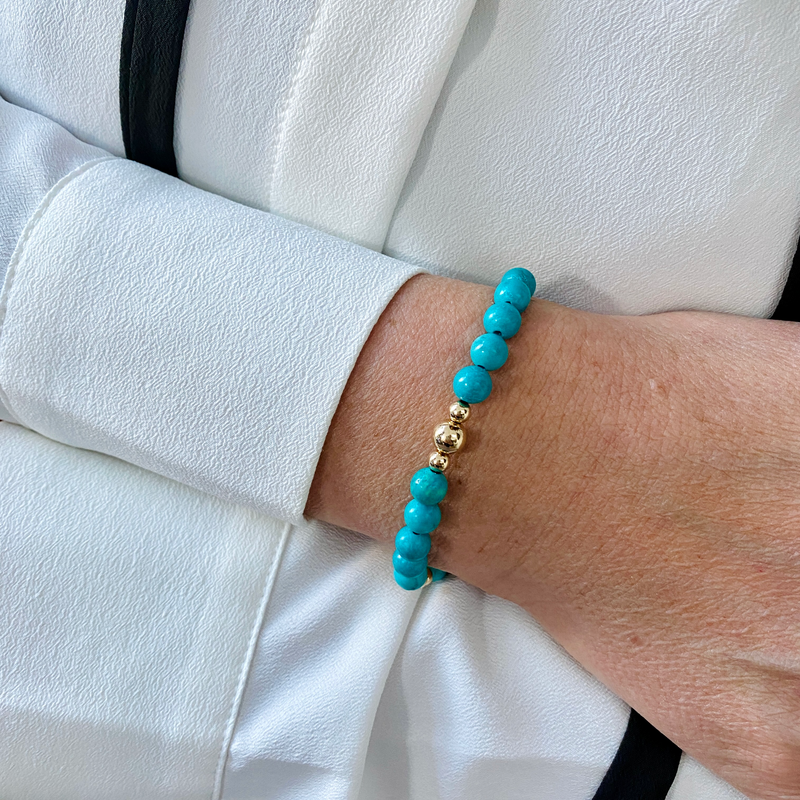 Bead bracelet with vibrant turquoise beads and 14k gold filled beads. Hand beaded bracelet made in the UK.