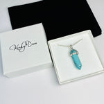 Point pendant necklace in turquoise with gift box. KookyTwo.