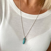 Turquoise point pendant necklace on sterling silver chain. Turquoise healing necklace.